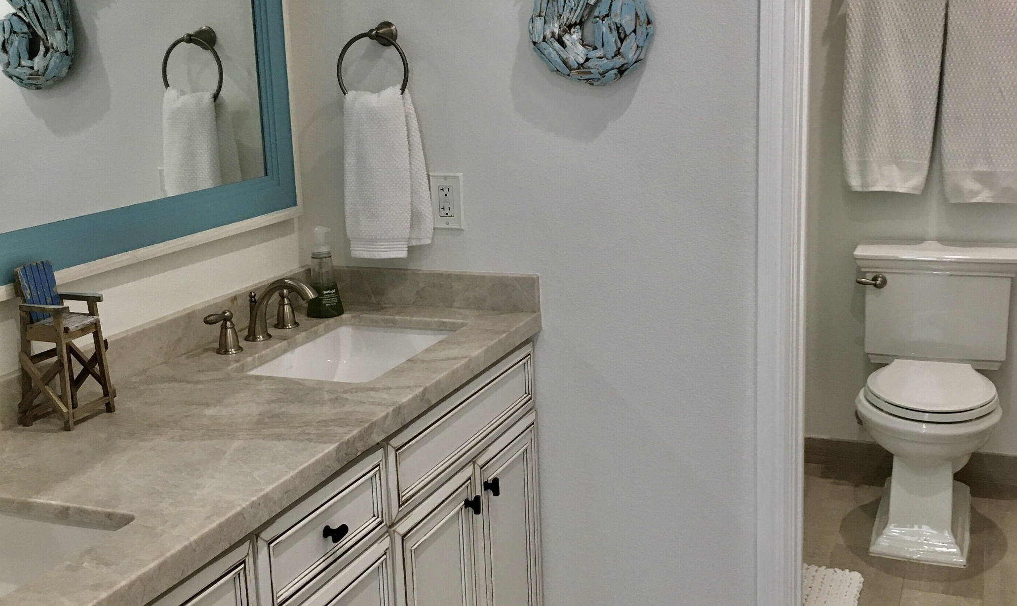 Bedroom 2 bath with double sink and water closet